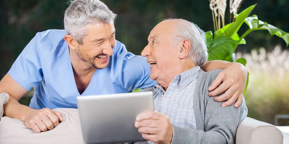 A mental health nurse delivering in-home care to an elderly woman.